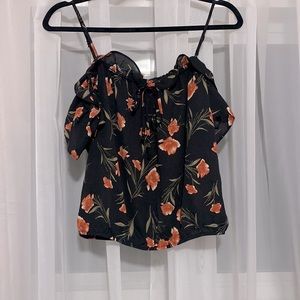 Sienna Sky. Over the shoulder. Spaghetti strap. Floral summer shirt.